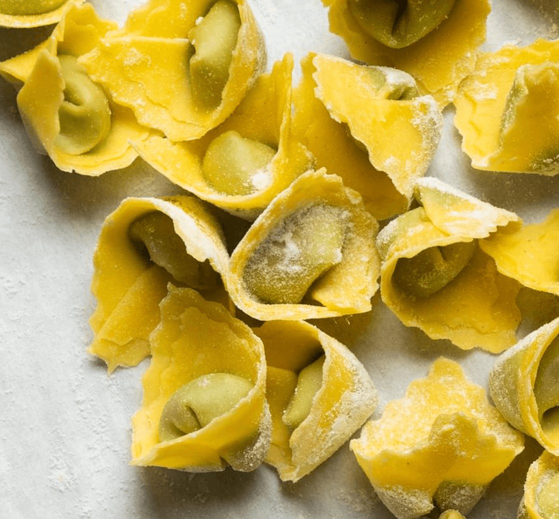 Freshly shaped filled pasta dusted with flour, from ICE's Handmade Filled Pastas class