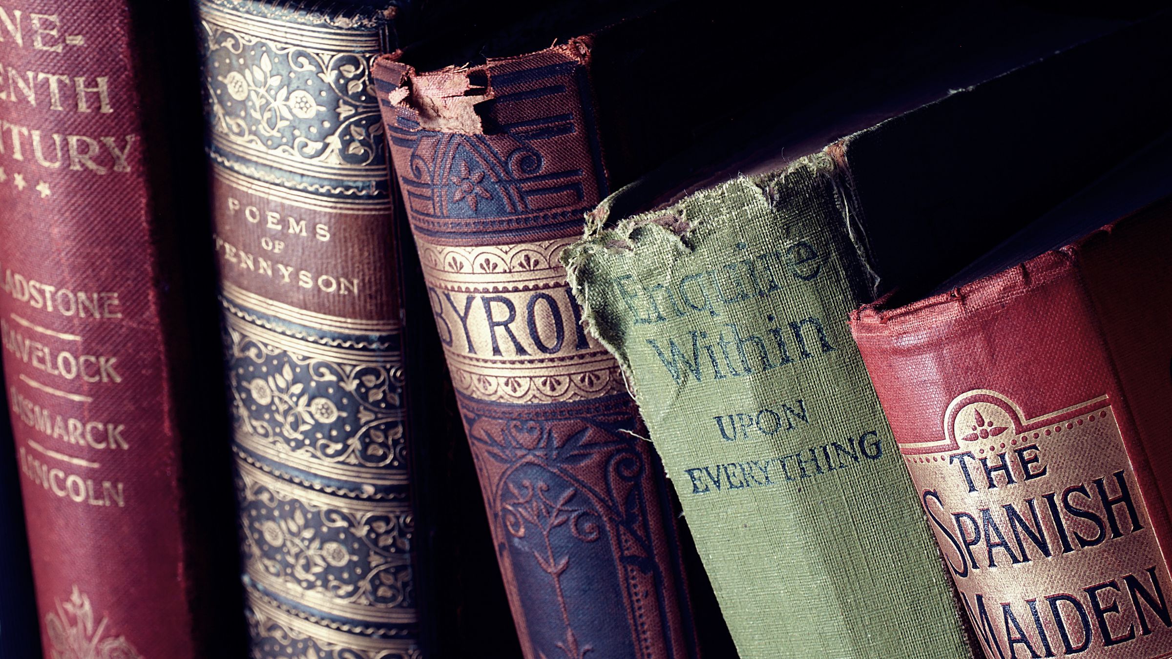 A row of old clothbound books