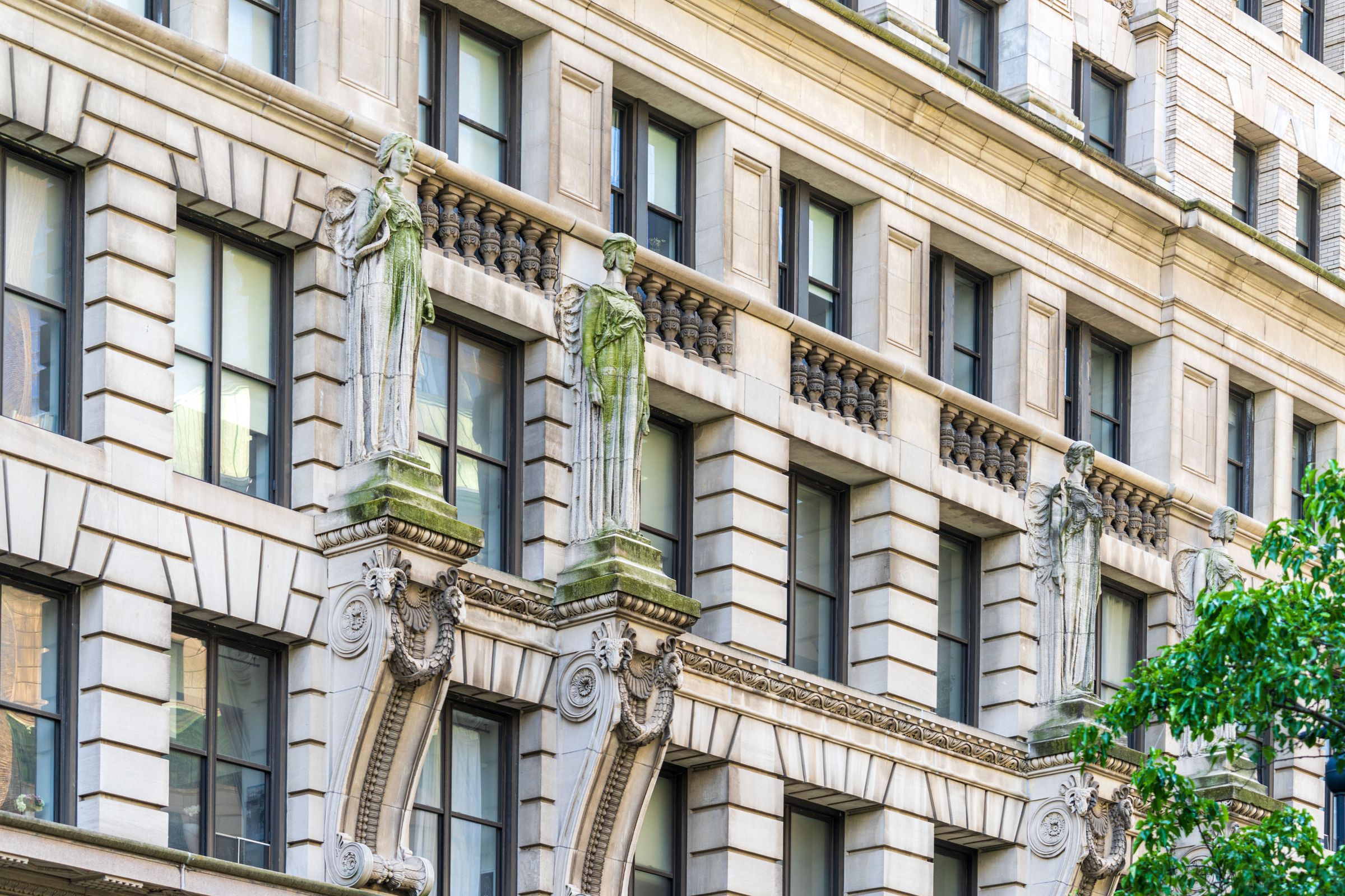 An ornate stone-and-iron facade on a New York building