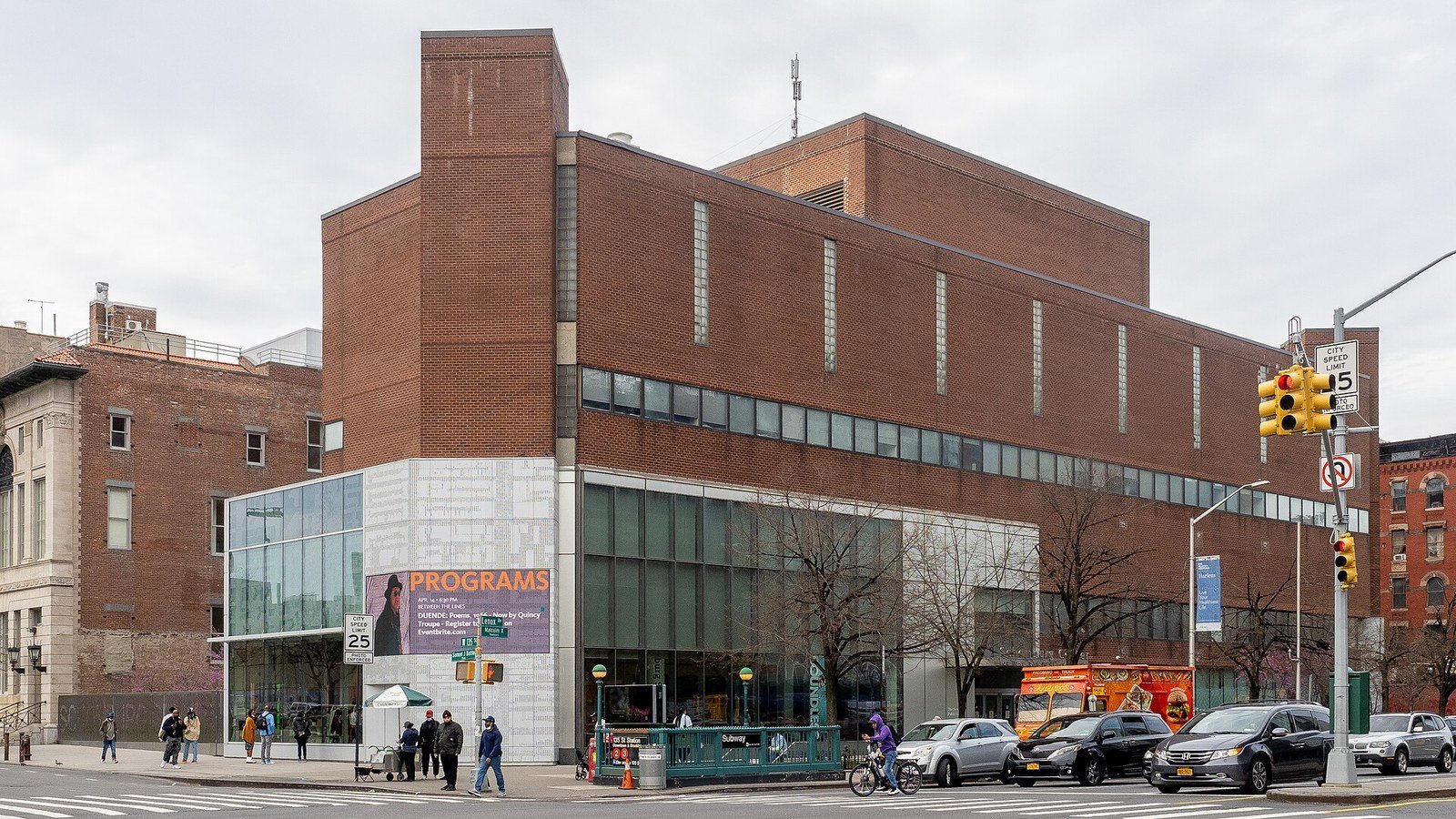 The Schomburg Center's brick and glass building at Malcolm X Boulevard and 135th Street