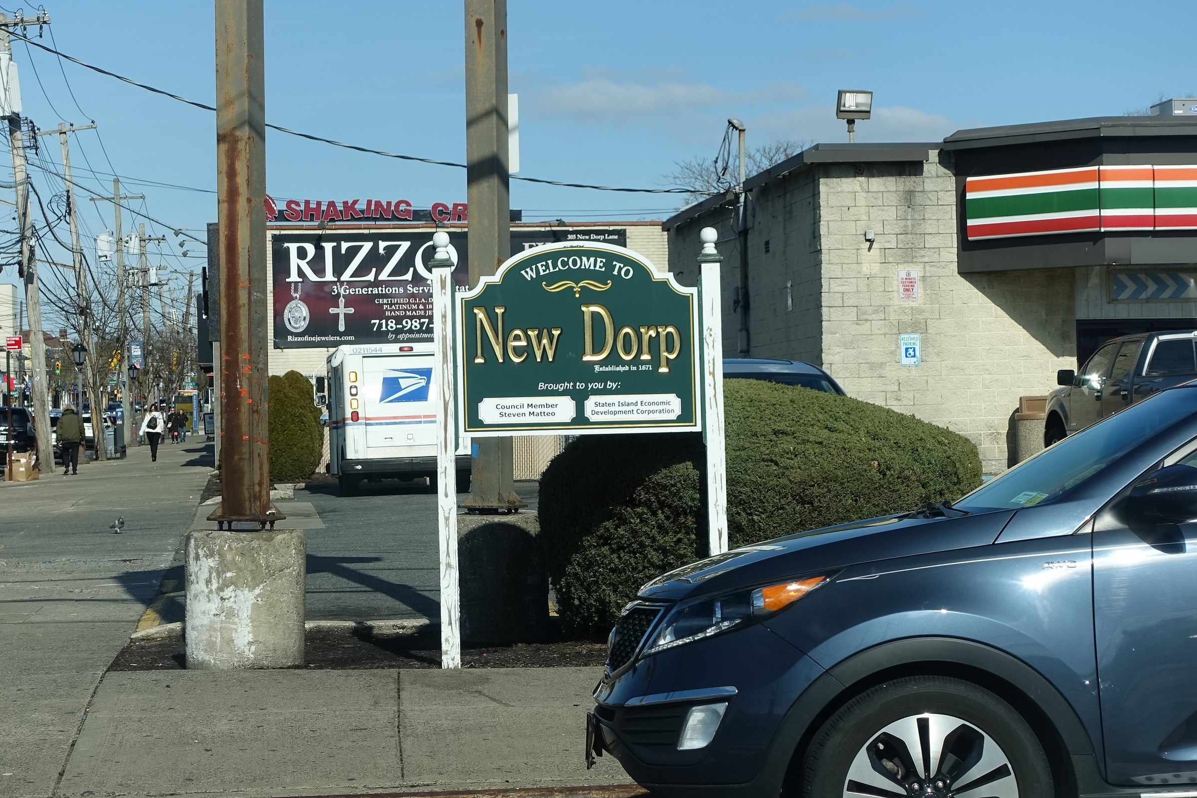 The 'Welcome to New Dorp' sign at Hylan Boulevard and New Dorp Lane, Staten Island