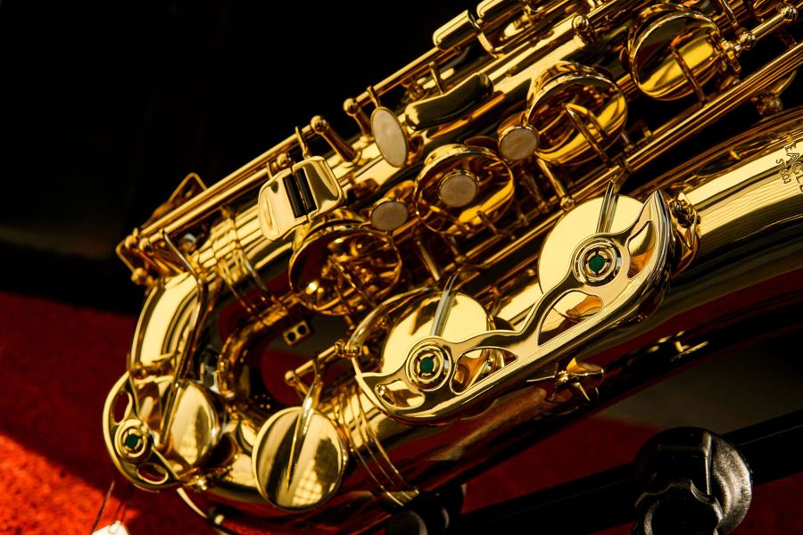 Close-up of the keys of a gold saxophone