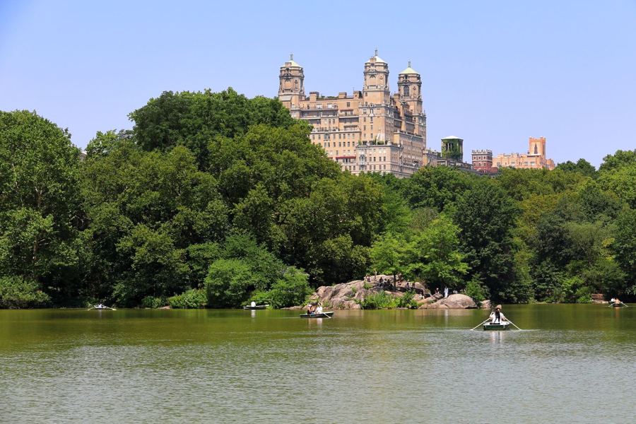 Rowboats on Central Park's Lake below the San Remo towers