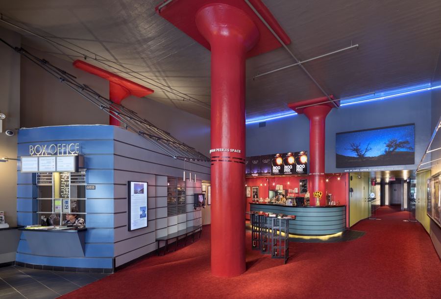 Film Forum's lobby, with red columns, the box office and the concession counter