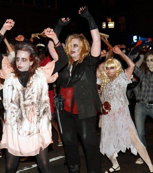 Zombies dancing up Sixth Avenue in the Village Halloween Parade