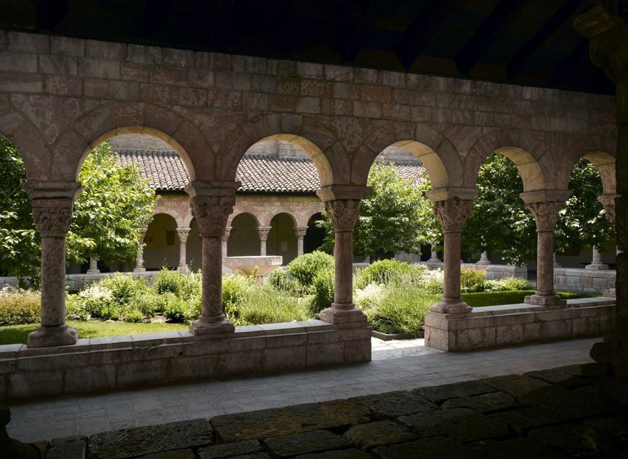 Looking through the arches into the sunlit Cuxa Cloister garden