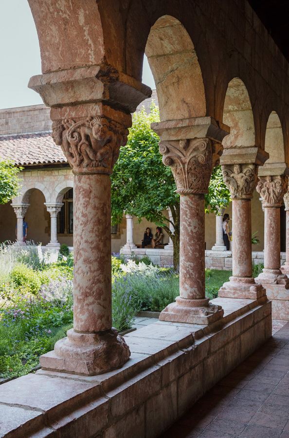 Carved pink marble columns along the Cuxa Cloister walk