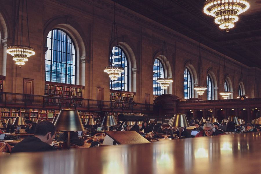 Arched windows and chandeliers in the Rose Main Reading Room