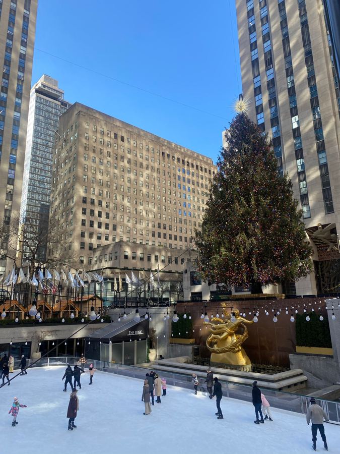 Skaters on the Rink at Rockefeller Center below the Christmas tree