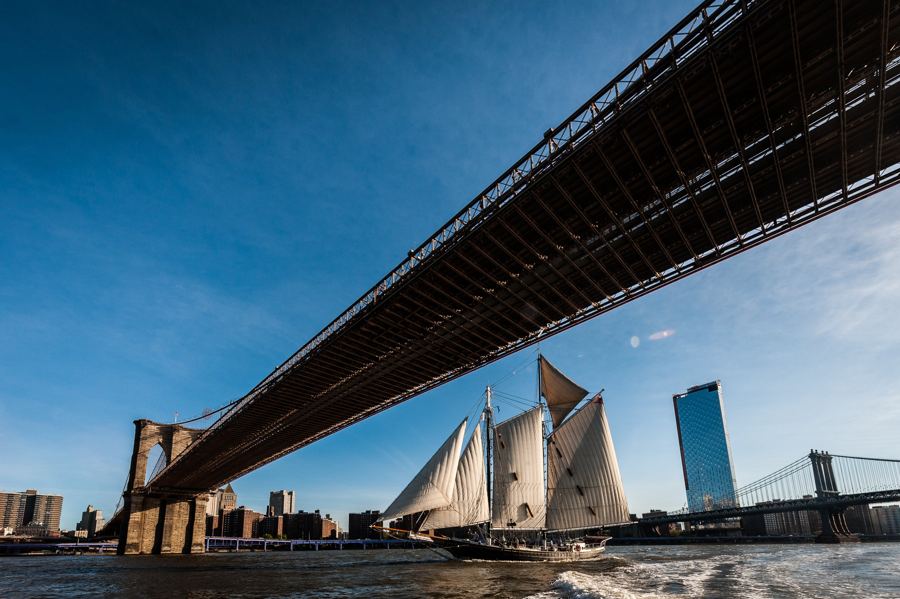 Pioneer's sails under the Brooklyn Bridge