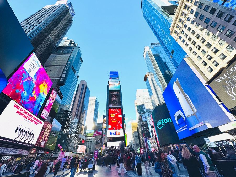 Billboards over Times Square on a sunny day