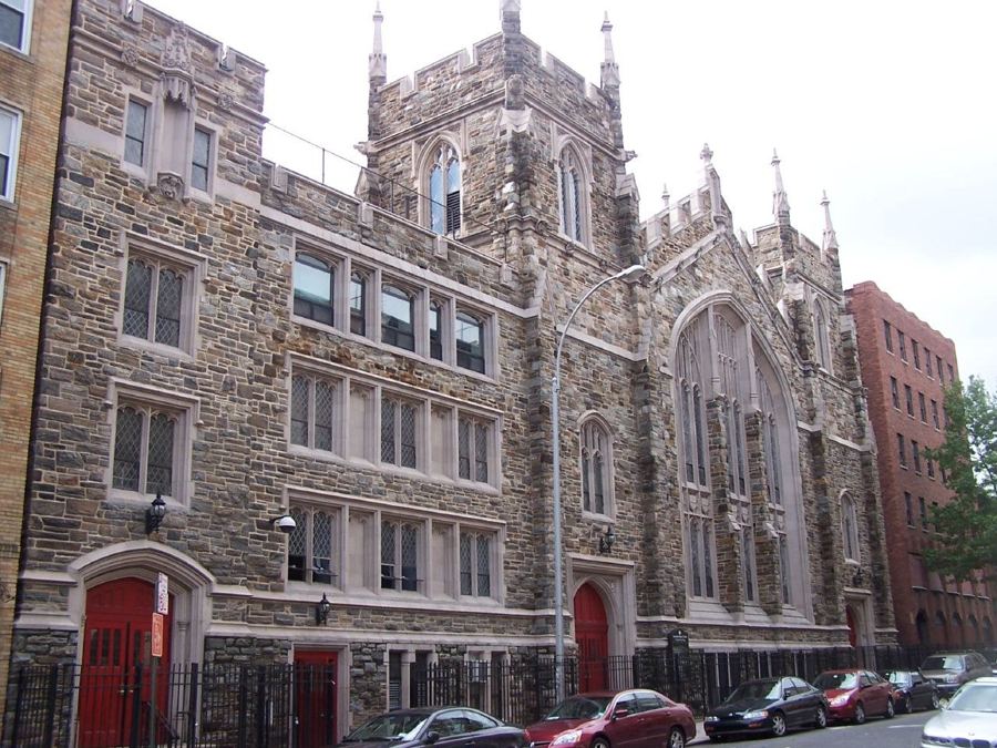 The stone Gothic facade of Abyssinian Baptist Church on West 138th Street in Harlem