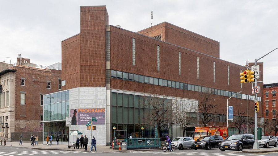 The Schomburg Center's brick and glass building at Malcolm X Boulevard and 135th Street