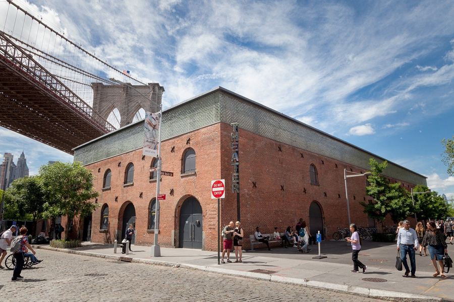 St. Ann's Warehouse, the brick former Tobacco Warehouse, beneath the Brooklyn Bridge in Brooklyn Bridge Park