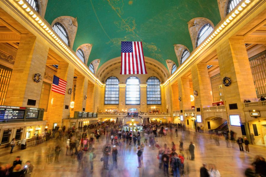 Grand Central's Main Concourse with its turquoise zodiac ceiling and the opal clock on the information booth