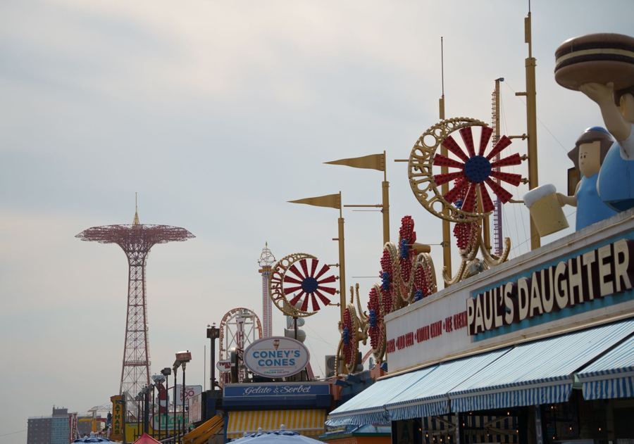 The Parachute Jump and boardwalk signs at Coney Island