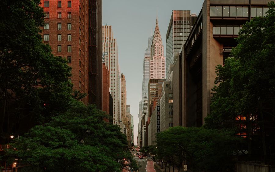 Midtown Manhattan towers along 42nd Street at dusk