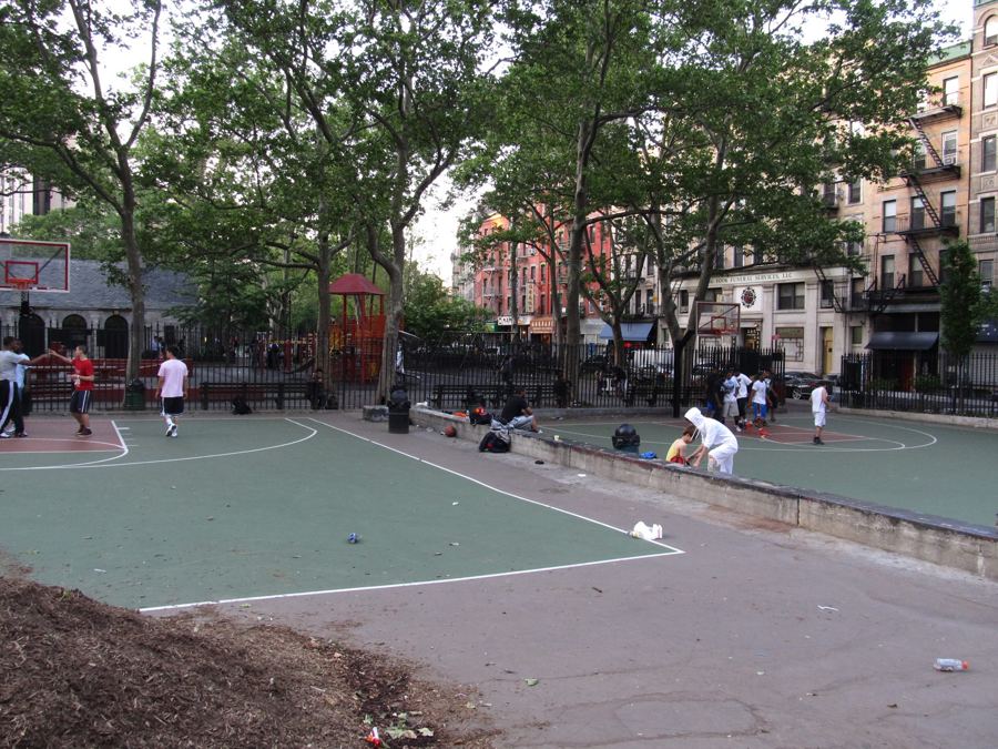 Columbus Park in Chinatown, its paved court ringed by trees