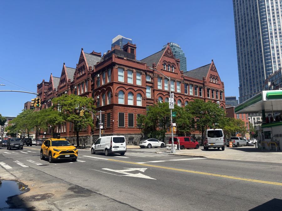 The red-brick former schoolhouse of MoMA PS1 in Long Island City, seen from the street