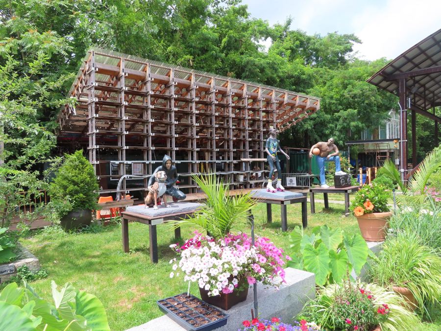 An outdoor art installation on the green lawns of Socrates Sculpture Park