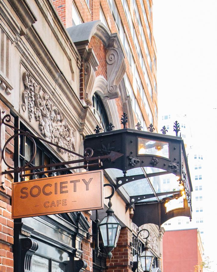 The Society Café sign on West 13th Street at Walker Hotel Greenwich Village