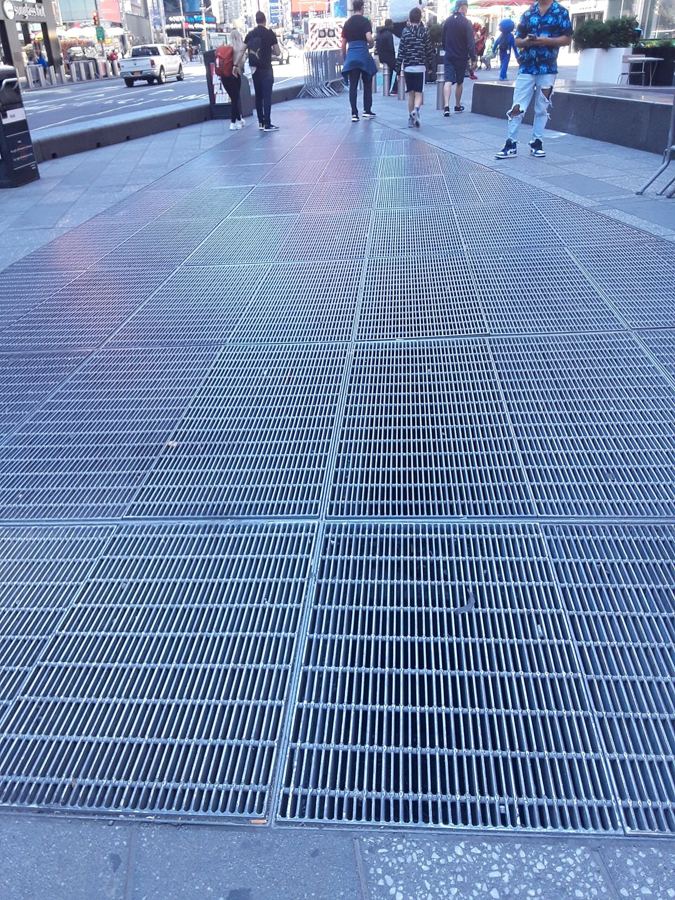 The subway grate on the Times Square pedestrian island where Max Neuhaus's sound work hums below