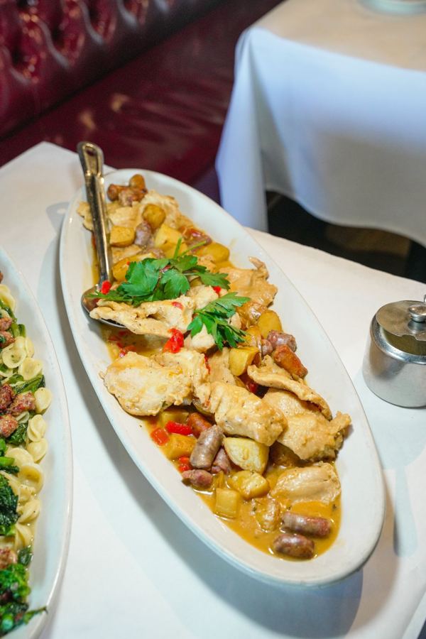 Chicken scarpariello on a platter at F & J Pine