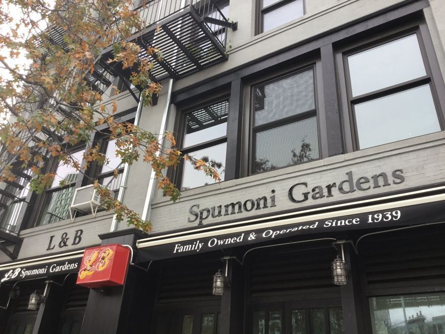 The facade of L&B Spumoni Gardens in Dumbo, with 'Spumoni Gardens – Family Owned & Operated Since 1939' lettering and the red L&B blade sign