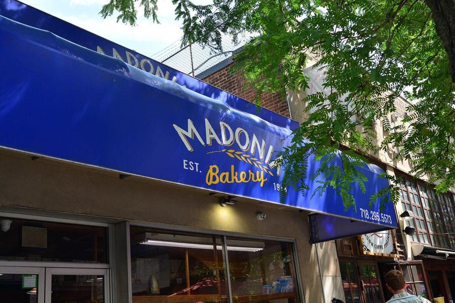 The blue awning of Madonia Bakery on Arthur Avenue in Belmont, the Bronx