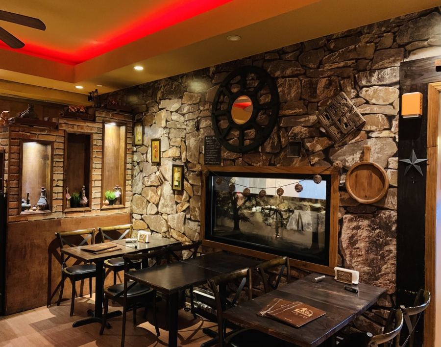 The stone-walled dining room at Toné Café
