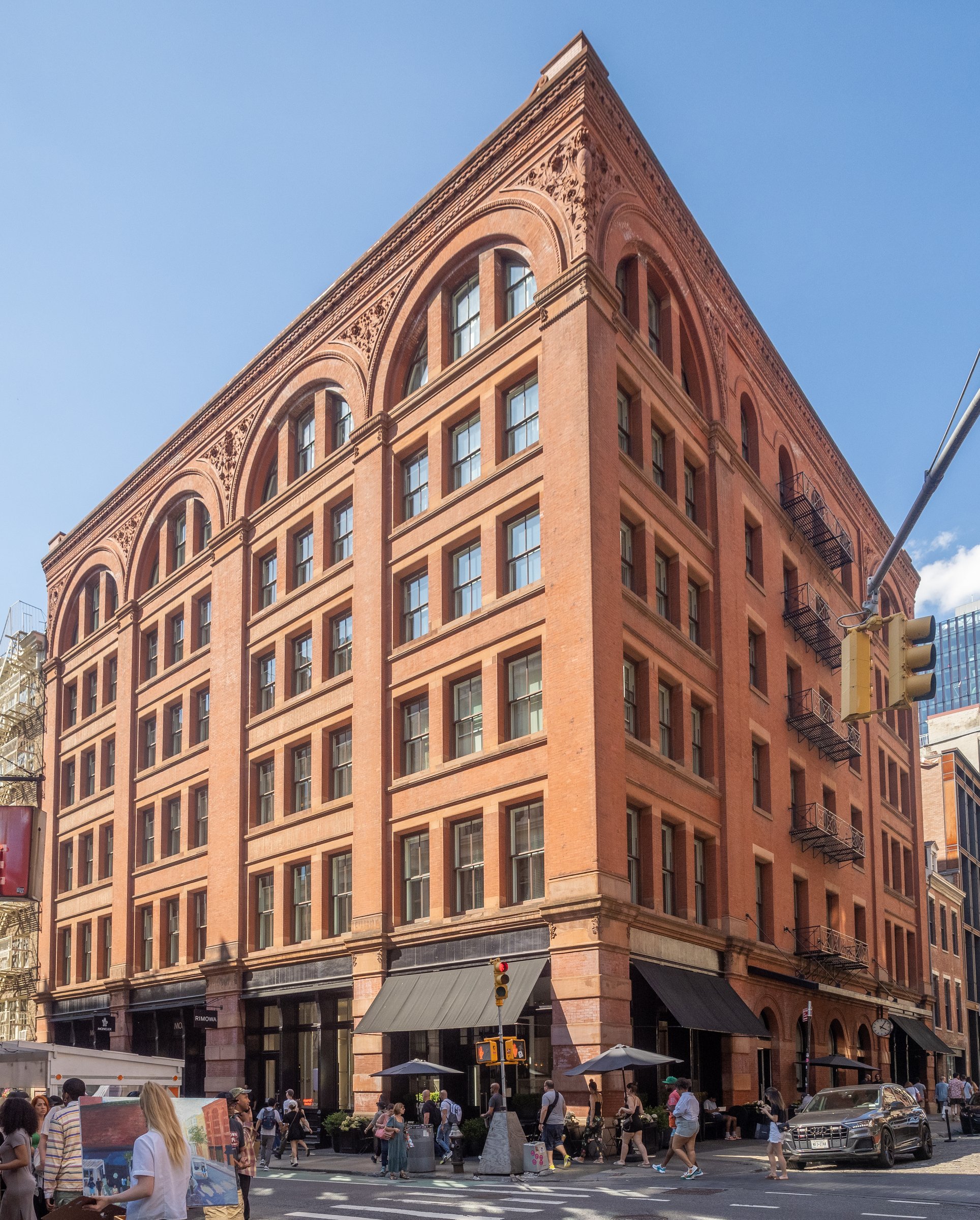 The Mercer's red-brick Romanesque Revival corner at Mercer and Prince Streets