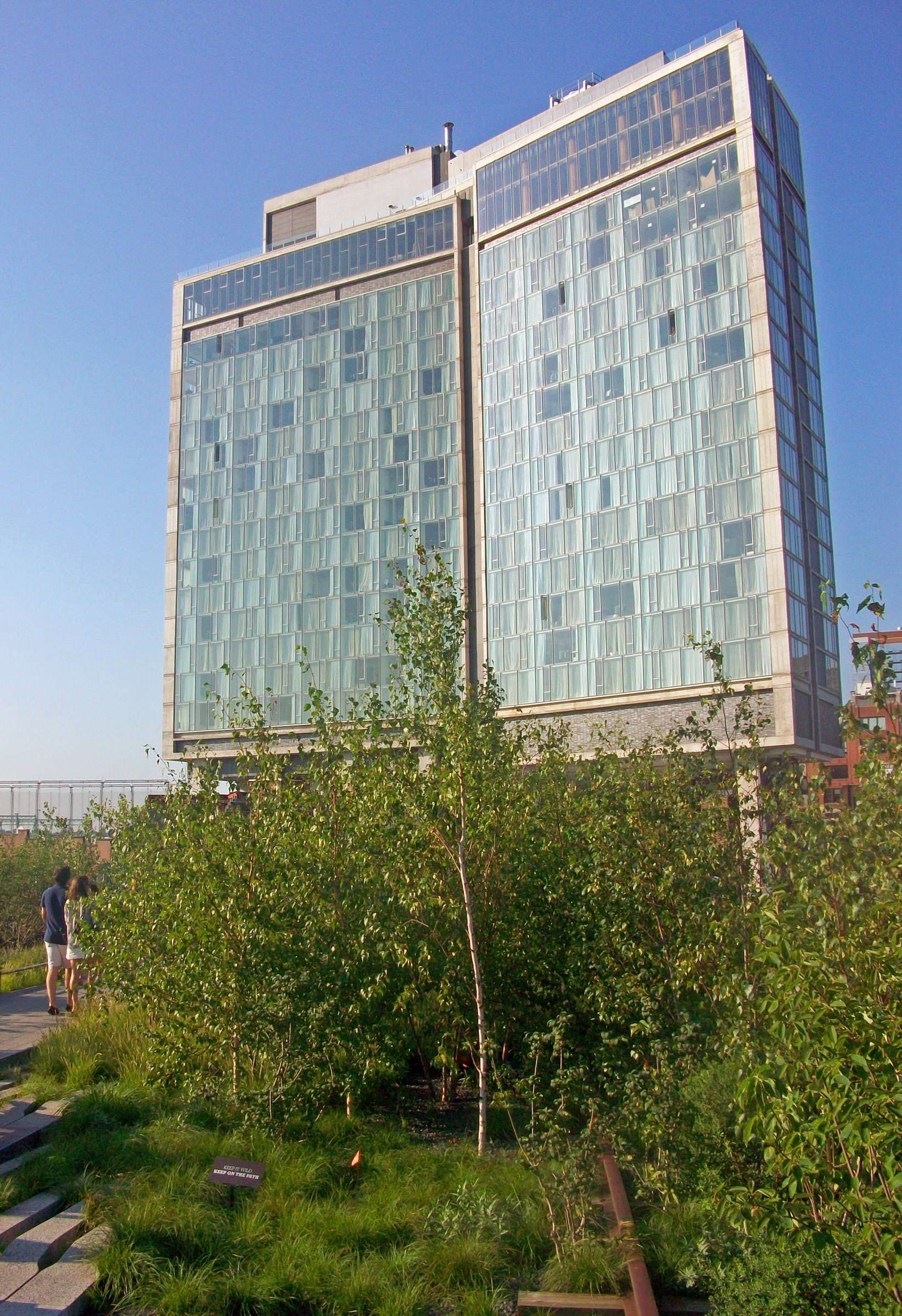The Standard, High Line rising over the planted walkway of the High Line