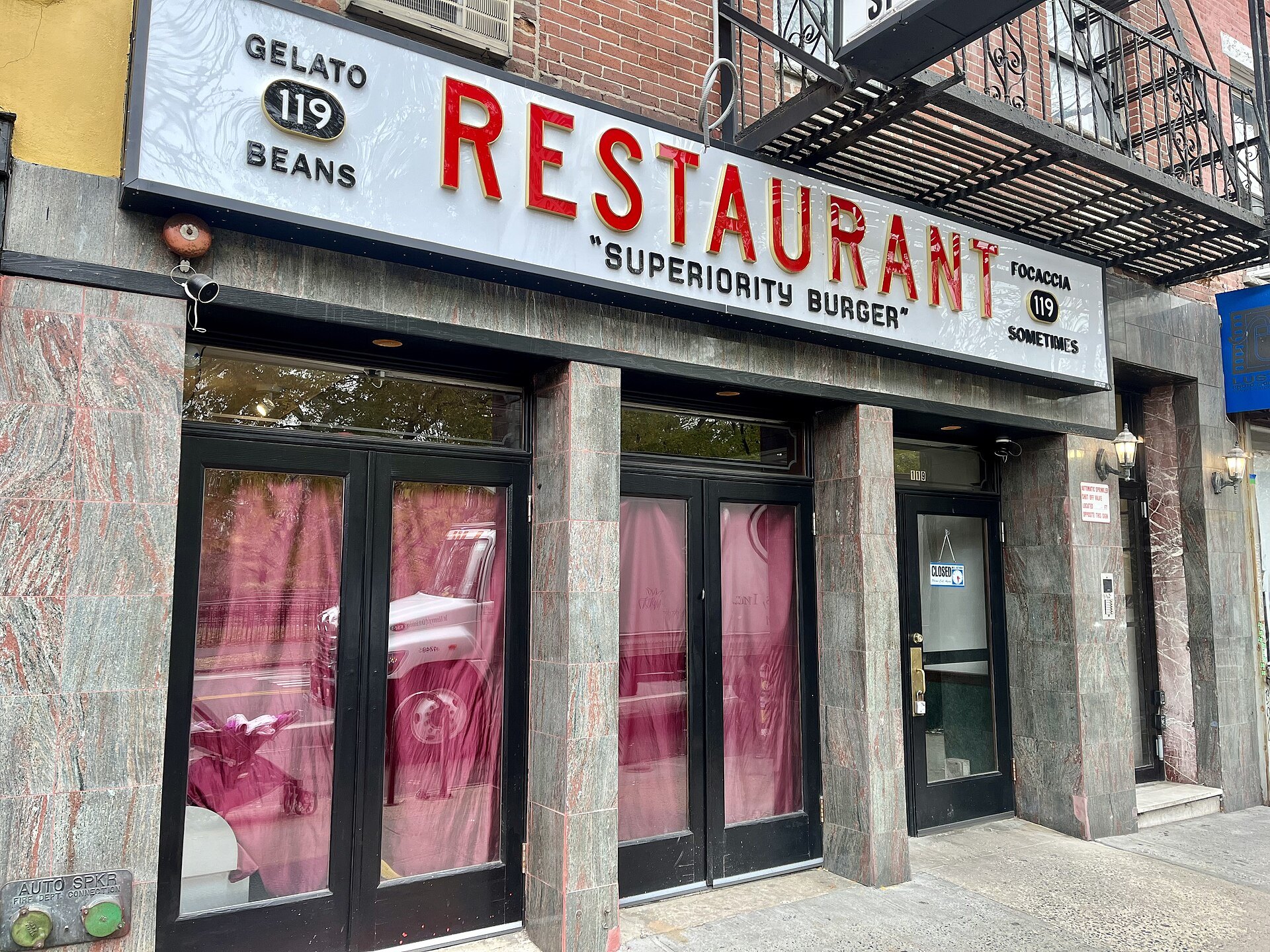 Superiority Burger behind the old 'Restaurant' sign of the former Odessa at 119 Avenue A in the East Village