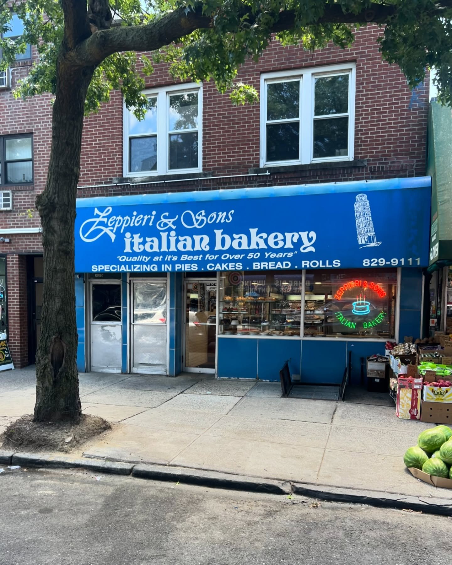 The blue awning of Zeppieri & Sons Italian Bakery on Buhre Avenue in Pelham Bay