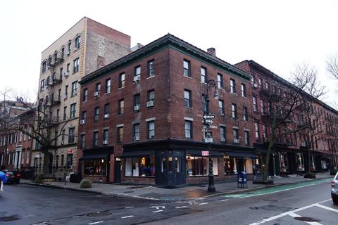 Brick storefront buildings at Bleecker and Bank Streets in the West Village